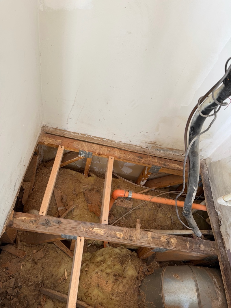 Floor demolition exposing joists